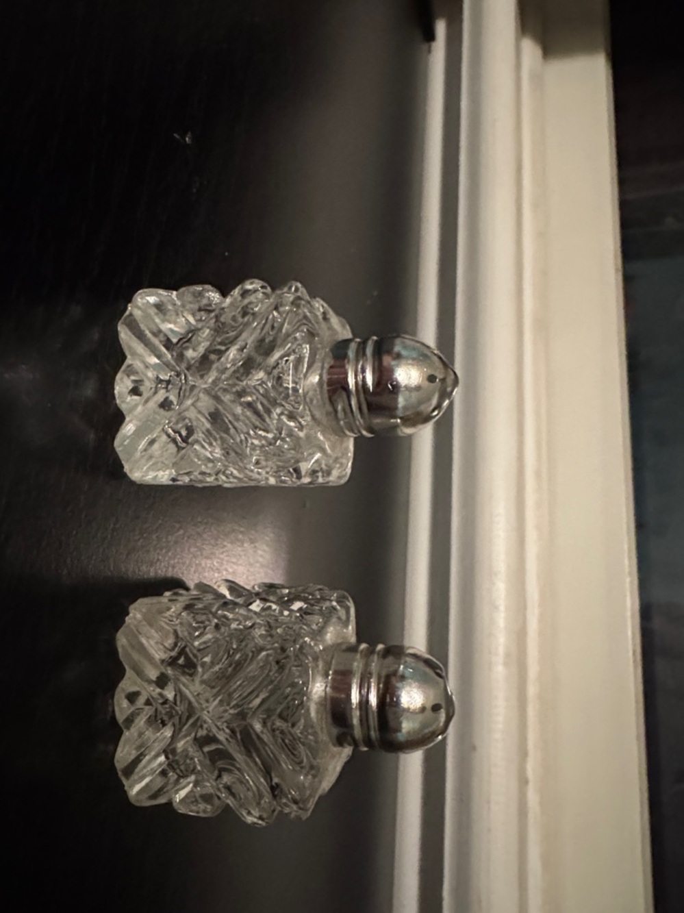 Petite glass salt/pepper shaker set.